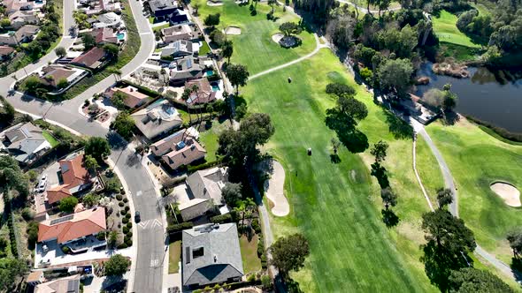 Aerial View of Green Golf in Upscale Residential Neighborhood in South California