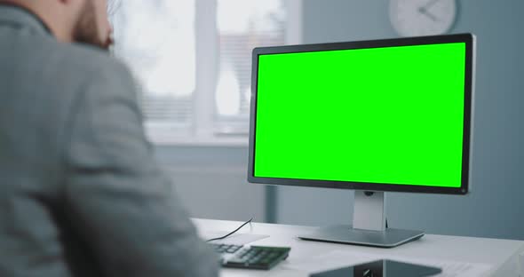 Businessman Using Chroma Key Pc