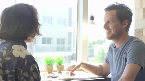 Friends chatting over coffee