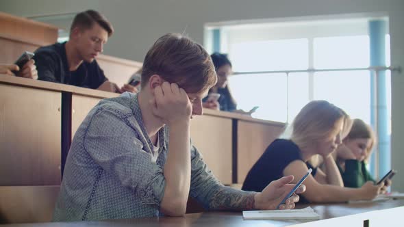 Students Chat Online in a University Classroom