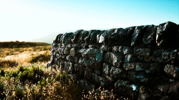 Scottish Land Border Stone Wall at Sunset