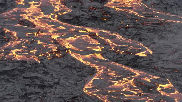 Lava Moving Over Black Rock In Iceland