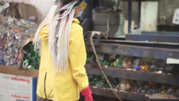 Womanworker in Yellow and Transparent Protecting Glasses Hard Hat and Mask Inspect Equipment on