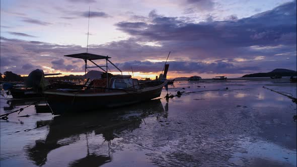 Time Lapse Colorful Sunrise Above Fishing Boat.