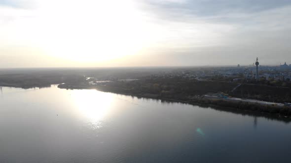 Scenic Galati City Landscape With Reflection Of Sunset Light On Danube River