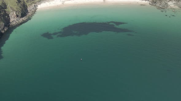 Keem Bay Beach In Achill Island Surrounded With Atlantic Ocean At Summer In Mayo, Ireland. - aerial