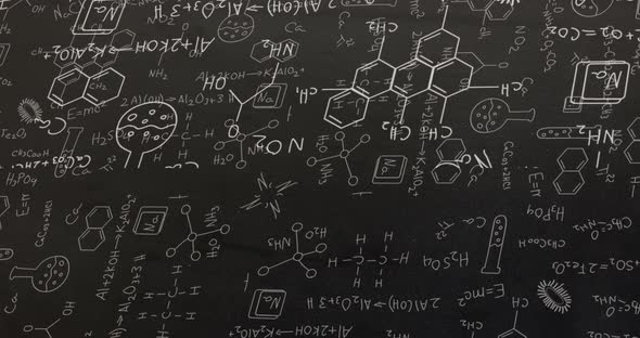 White structural formulae of chemical compounds on blackboard