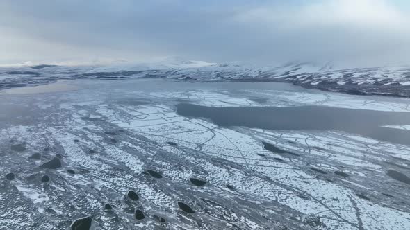 Aerial view of frozen Lake Paravani. The largest lake in Georgia