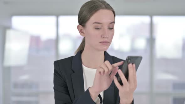 Portrait of Attractive Young Businesswoman Using Smartphone 