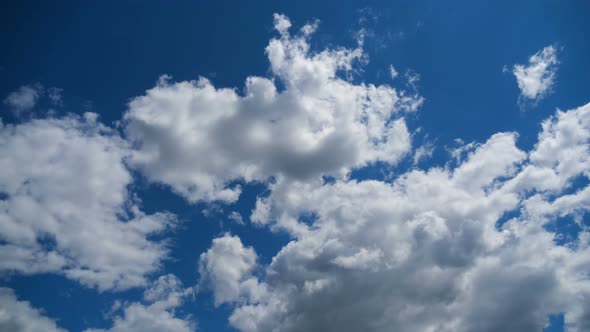 Clouds Move Smoothly in the Blue Sky. Timelapse