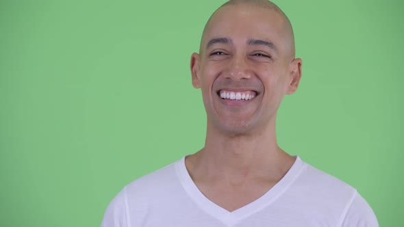 Face of Happy Handsome Bald Man Thinking