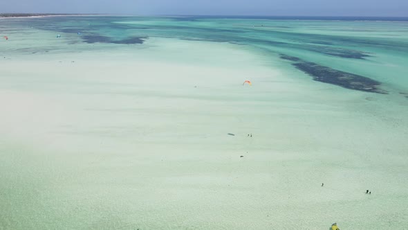 Kitesurfing Near the Shore of Zanzibar Tanzania