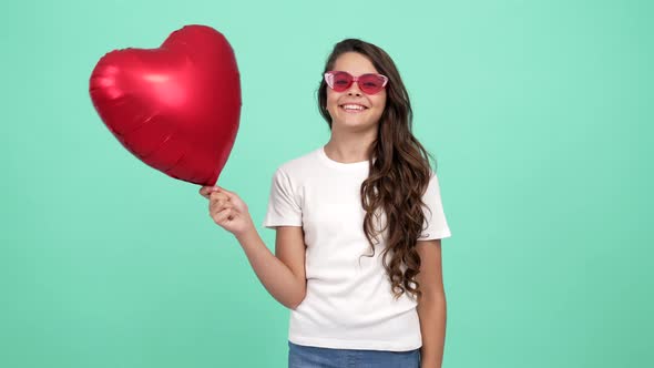 Portrait of Happy Surprised Kid with Heart Party Balloon Happiness and Surprise