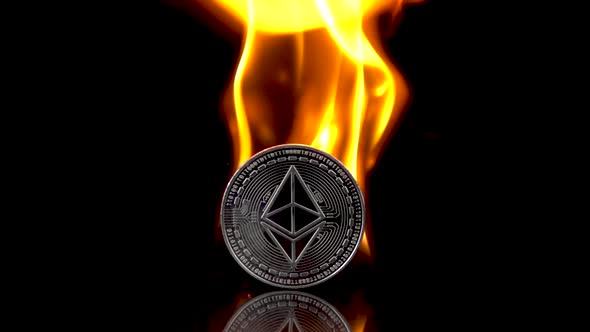 Ethereum Coin Catches Fire on an Isolated Black Background