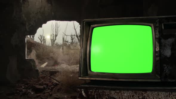 Vintage Old Television Set Turning On Green Screen Inside an Abandoned House.