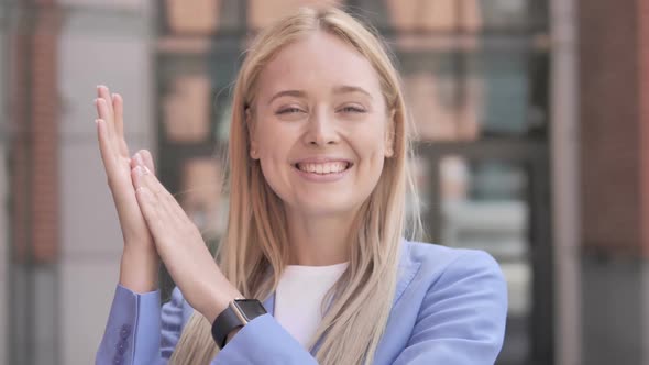 Applauding Young Businesswoman Clapping