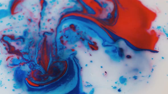 Multicolored Ink Swirls Under Water and Oil Creating Colorful Bubbles and Patterns