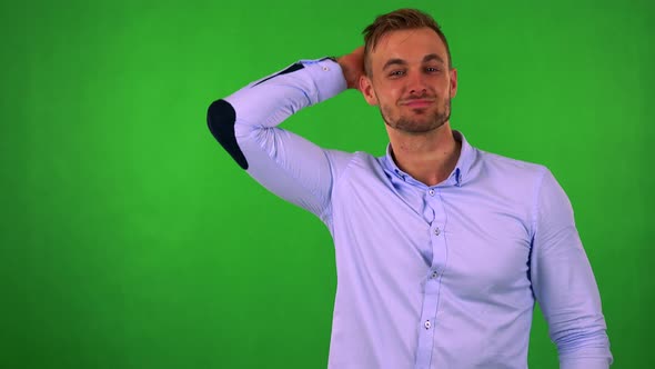 Young Handsome Business Man Does Poses To Camera - Green Screen - Studio