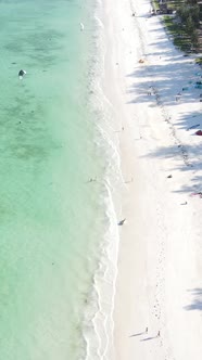 Vertical Video Boats in the Ocean Near the Coast of Zanzibar Tanzania