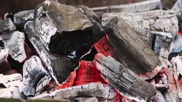 A Hot Fire Burns in a Charcoal Grill