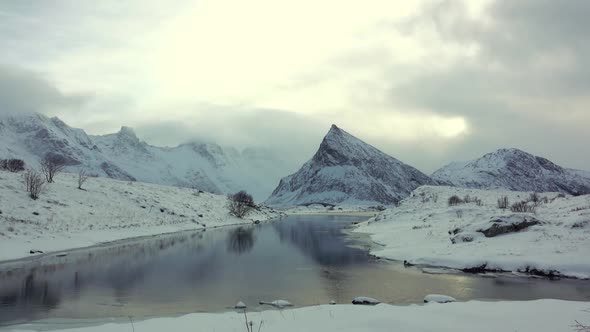 Clouds Over the Mountainous Northern Lake