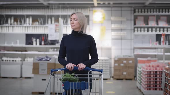 A Woman in a Large Home Improvement Store