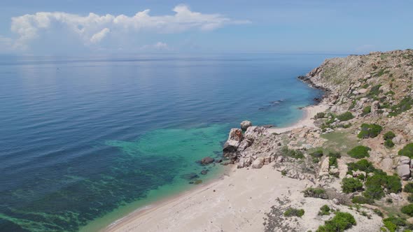 Aerial at tropical Turtle Beach on sunny summer day, Vietnam Coast