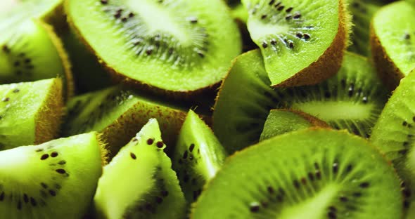 Closeup of Juicy Ripe Kiwi Slices on a Large Plate