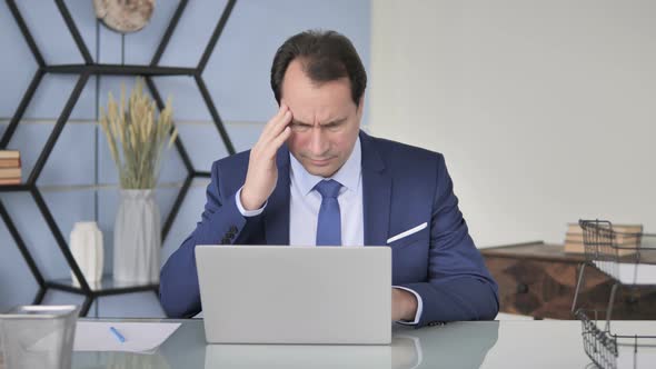 Headache, Businessman with Pain in Head Working In Office