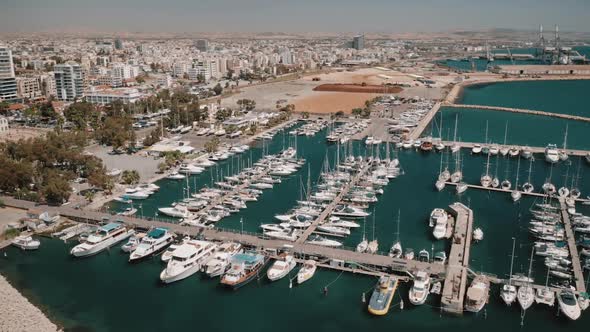 Coastal City or Town Port Harbor with Modern Yachts Sailboats Moored at Bay