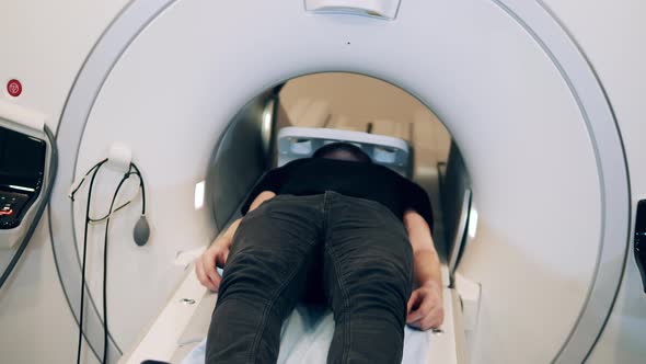 Patient Is Moving Out of the MRI Scanner