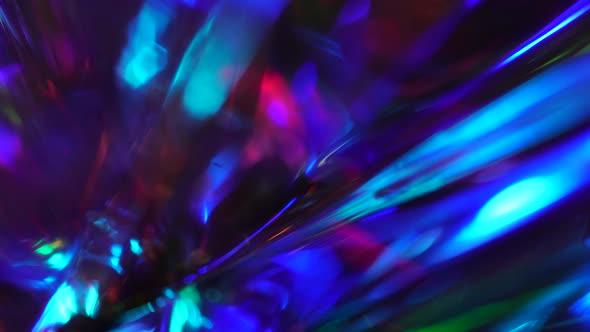 Crystal prism refracting light in vivid rainbow colors