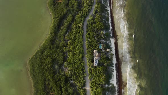 Aerial shot of beautiful Coastlines, tilting up. Mexico, Tuluum.