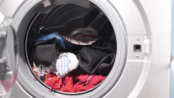 Close Up of Cloths in a Washing Machine