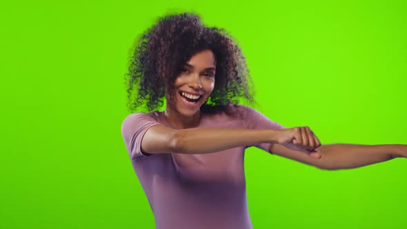 African American Woman Dances Actively, Enjoys Vibes, Smiles Happily, Chroma Key