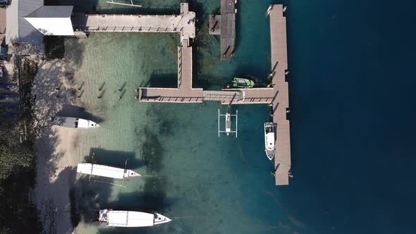 Abandoned dock pier on Gili Island in Indonesia during covid19 pandemic lockdown.Aerial top down vie