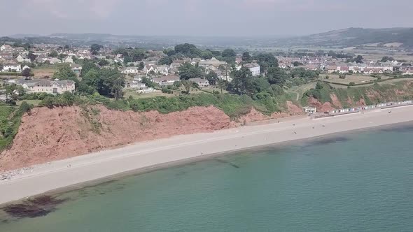 Coastline view from the sky of Seaton England. Beautiful beach and town visible from the sky. White