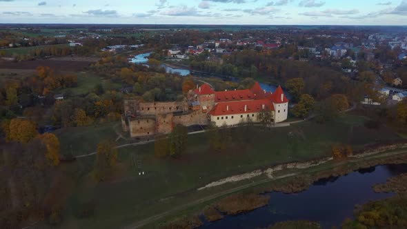 Bauska Medieval Castle Ruins Complex and Park From Above Aerial Shot 4K Video