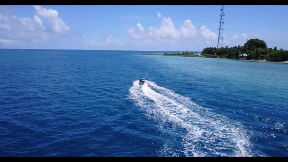 Aerial drone sky of beautiful lagoon beach vacation by blue ocean with white sand background of a da