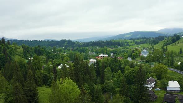 Aerial View of a Green Rural Area Under Blue Sky