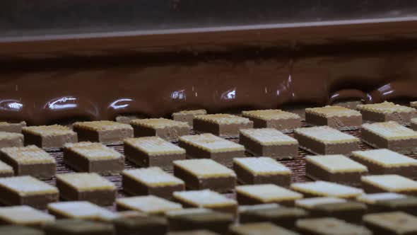 Modern Confectionery Shop Filling Waffles with Chocolate