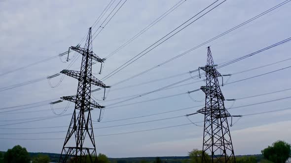 Voltage electric transmission tower. High voltage lines and power pylons