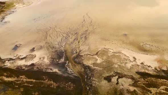 Abstract aerial view of algae bloom in sea on the island of Vormsi in Estonia.