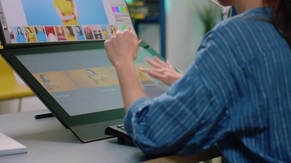 Close Up of Photographer Hands Using Touch Screen Monitor