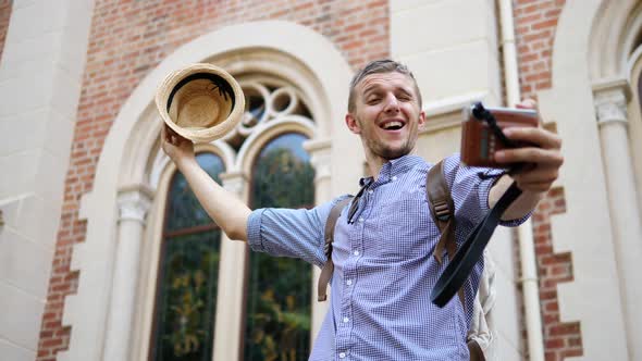 Tourist Traveller Man Taking Selfie While Sightseeing In City