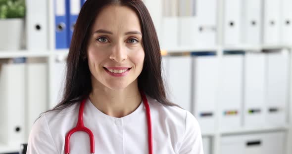 Portrait of Smiling Female Doctor in White Uniform at Clinic  Movie Slow Motion