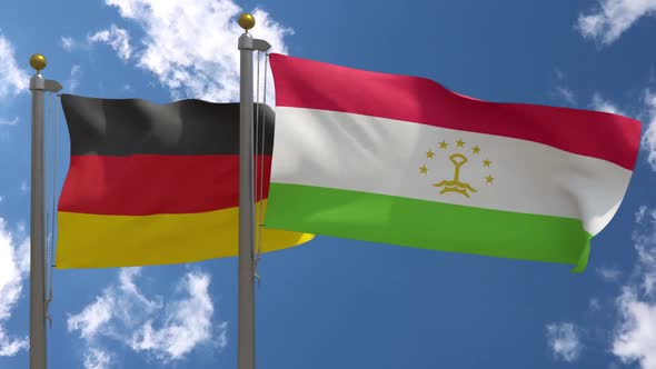 Germany Flag Vs Tajikistan On Flagpole