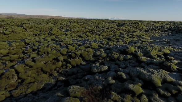 Flying Over Rocks And Moss In Iceland