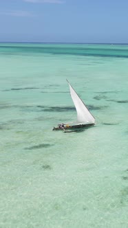 Vertical Video Boats in the Ocean Near the Coast of Zanzibar Tanzania