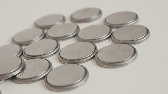 Slow pan on  button watch batteries 4K panning video